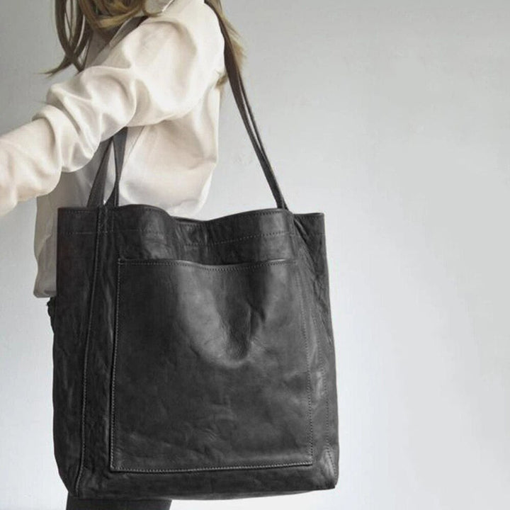 https://cdn.shopify.com/s/files/1/0750/0519/8393/files/NF1IVrouwen-Zachte-Pu-Lederen-Schoudertas-Toevallige-Vintage-Grote-Handtassen-Mode-Nieuwe-Eenvoudige-Onderarm-Tassen-Luxe-Designer.jpg?v=1758575477
