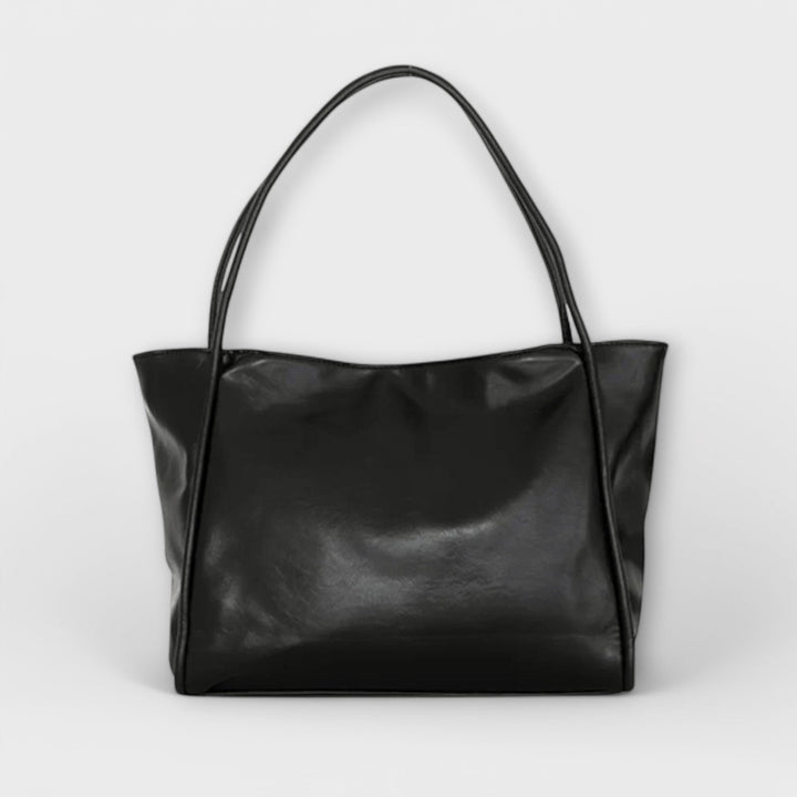 https://cdn.shopify.com/s/files/1/0750/0519/8393/files/blair_black1_63e58a2a-cf1b-43f2-96fa-2aa5966c8a0b-Photoroom.jpg?v=1758575476