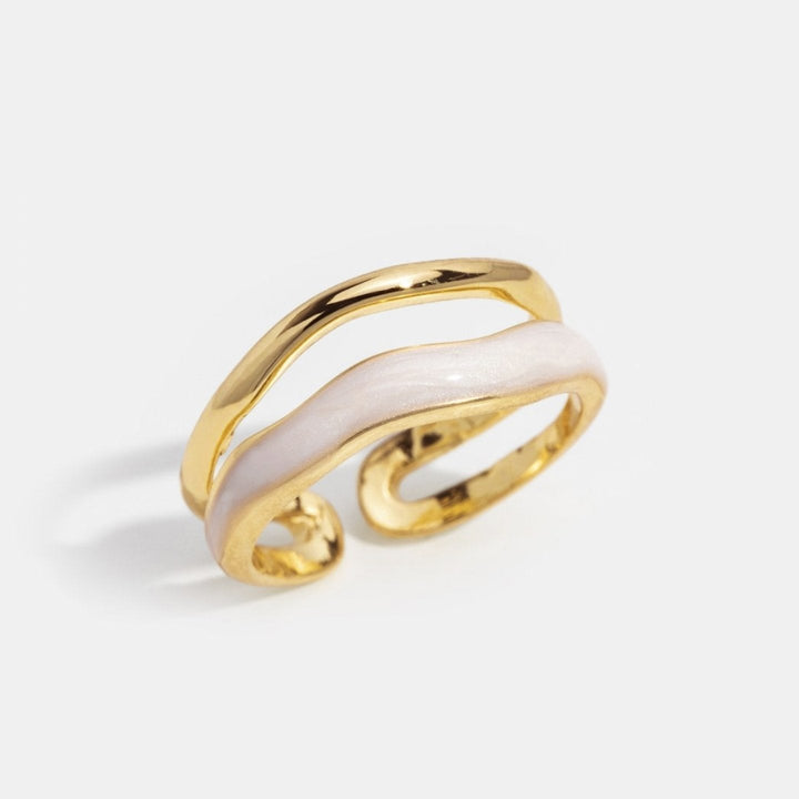 https://cdn.shopify.com/s/files/1/0750/0519/8393/files/layered-sahara-gold-ring-137494_cc8f8dcf-6c24-4106-9181-3a8ac3729db0.jpg?v=1758576302