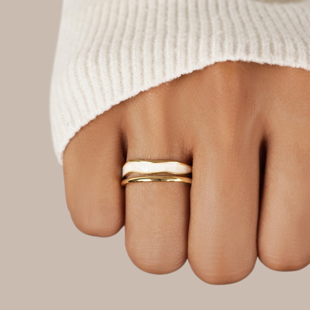 https://cdn.shopify.com/s/files/1/0750/0519/8393/files/layered-sahara-gold-ring-536491_85acd682-6b41-4c97-a0be-4a6a46f302fb.jpg?v=1758576301